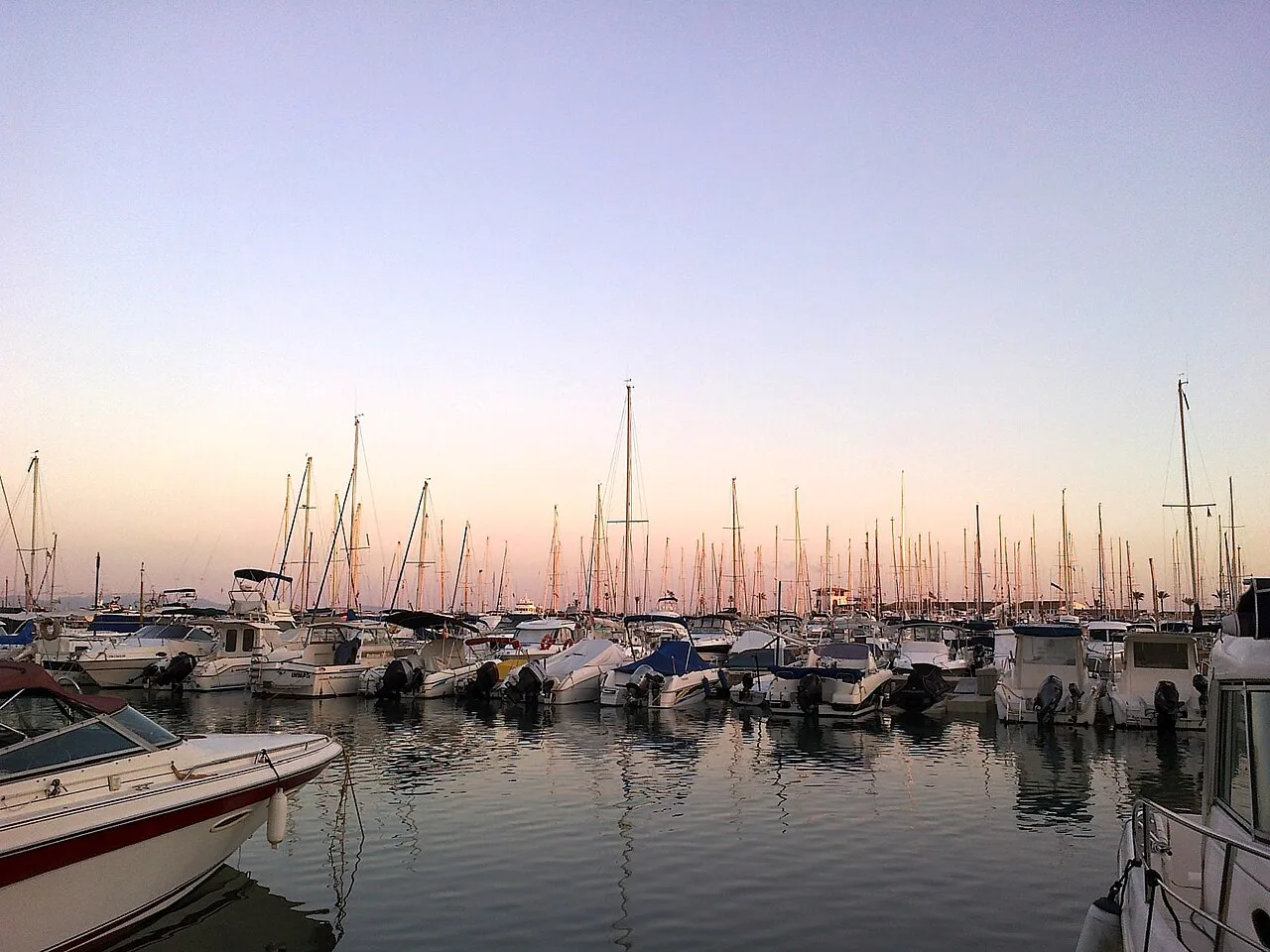 Yachts in the port of Alcúdia at dusk.