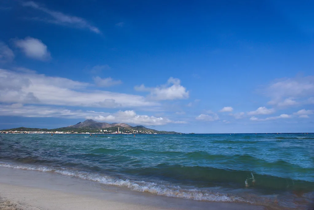 The sea and headland seen from Alcúdia beach, Mallorca.