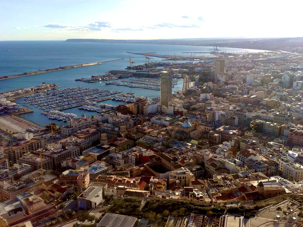 Alicante's rooftops and harbour seen from above the old town.