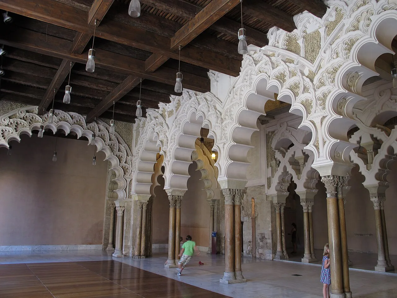 Interlaced Islamic arches in the Aljafería Palace, Zaragoza.