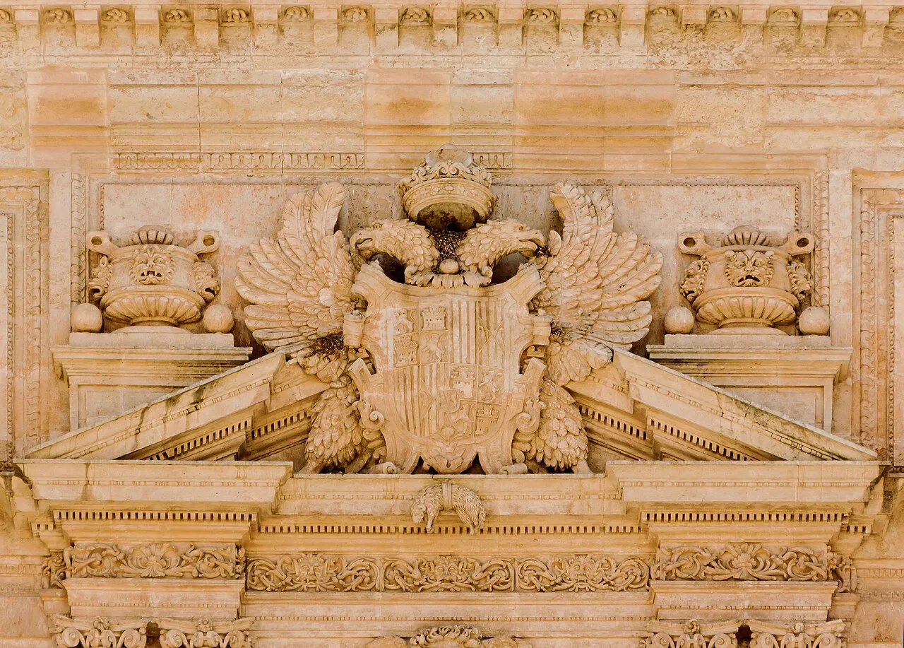 The pediment with the arms of Charles V above the entrance of Almería Cathedral.