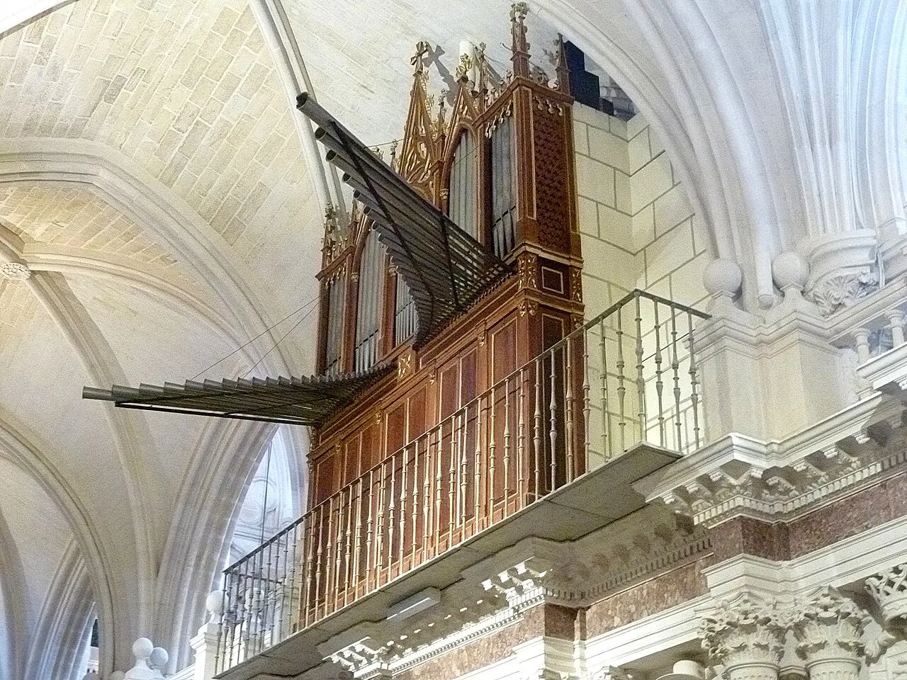 An organ with horizontal trumpets inside Burgos Cathedral.