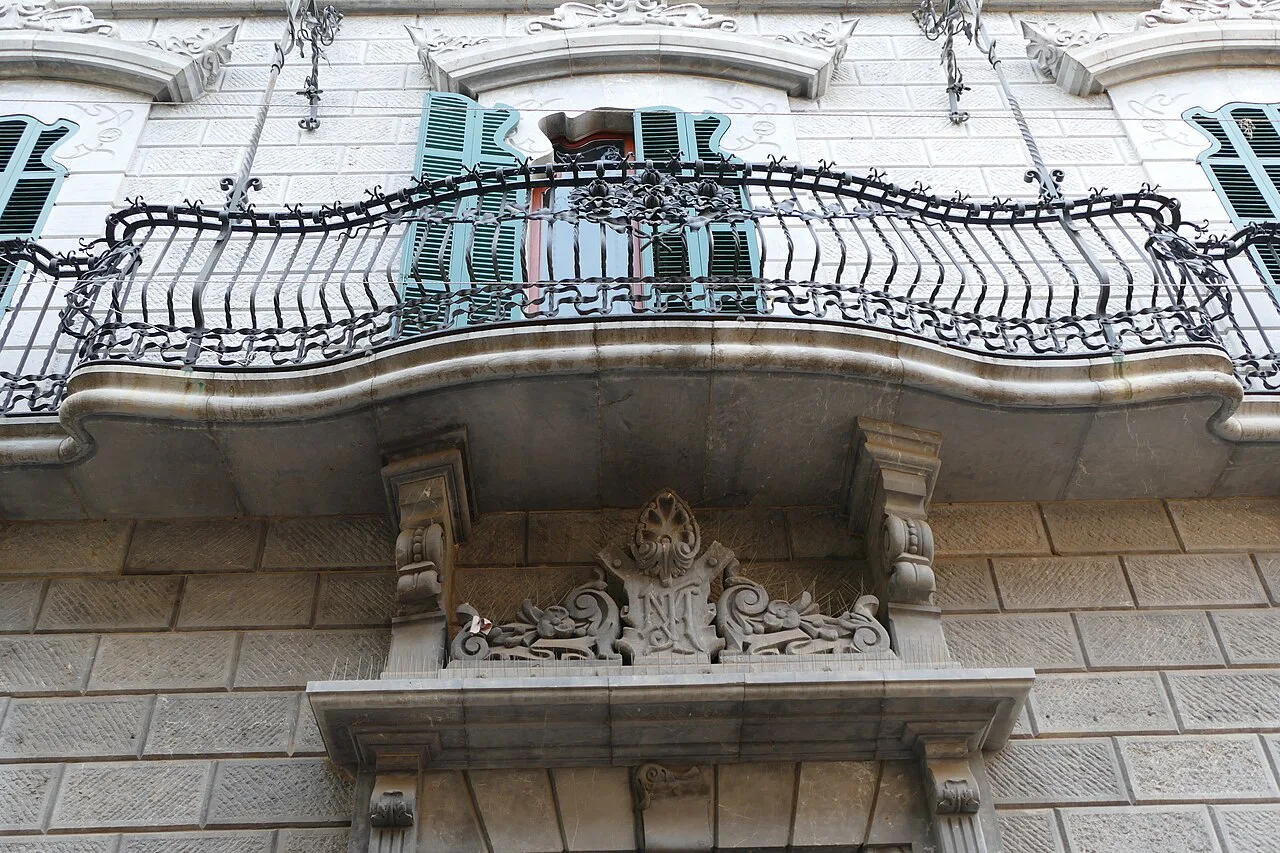 A wrought-iron balcony on the facade of Can Prunera, Sóller.