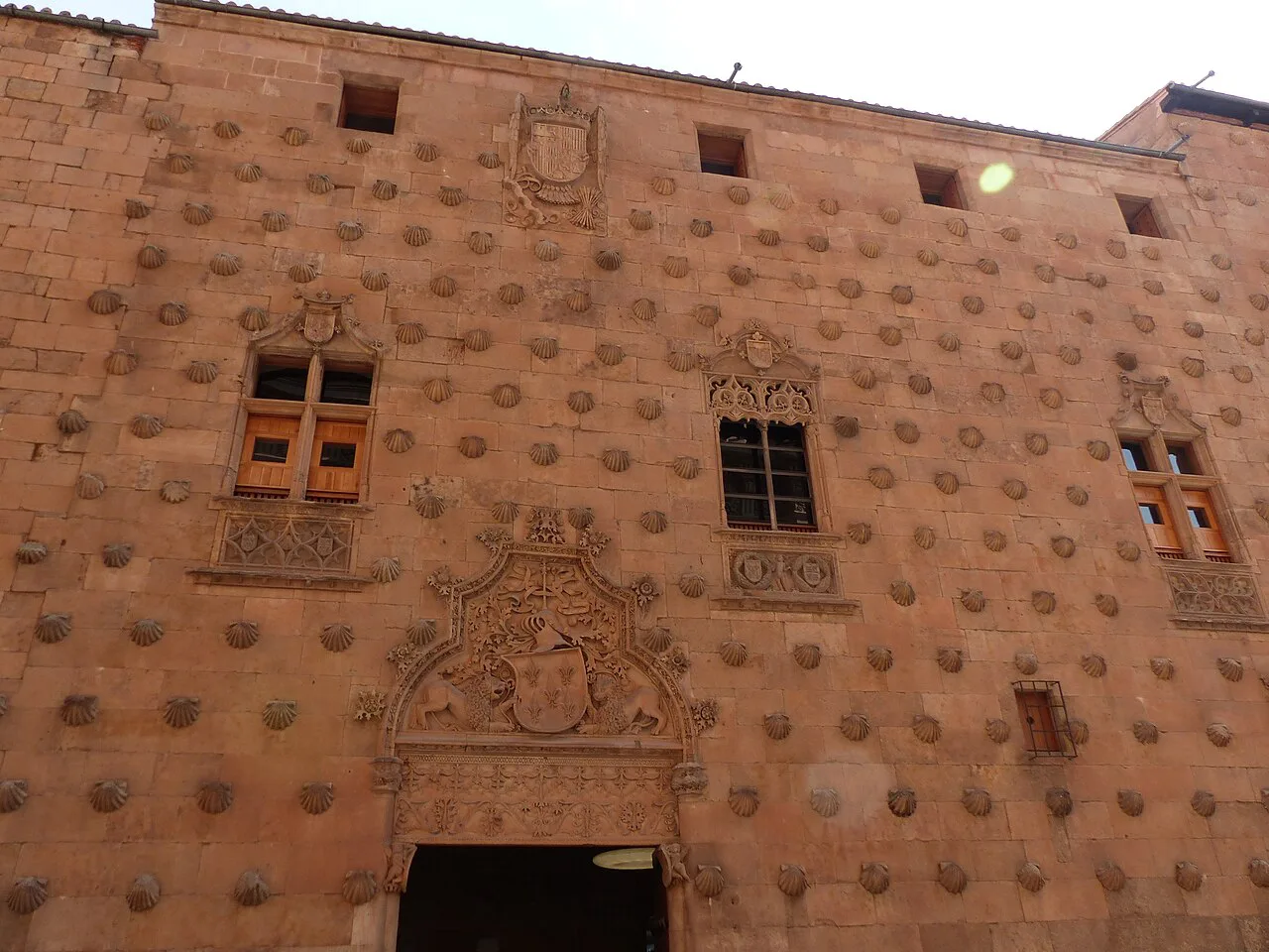 The shell-covered façade of the Casa de las Conchas in Salamanca.