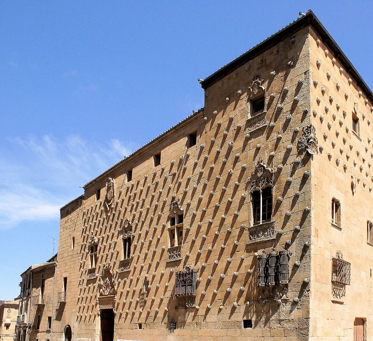 The shell-studded façade of the Casa de las Conchas in Salamanca.