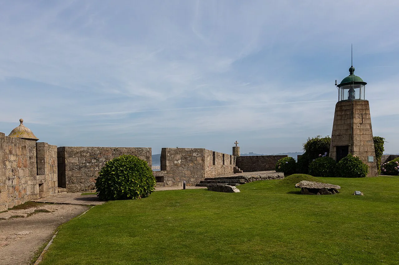 Walls and lighthouse of the Castle of San Antón, A Coruña.