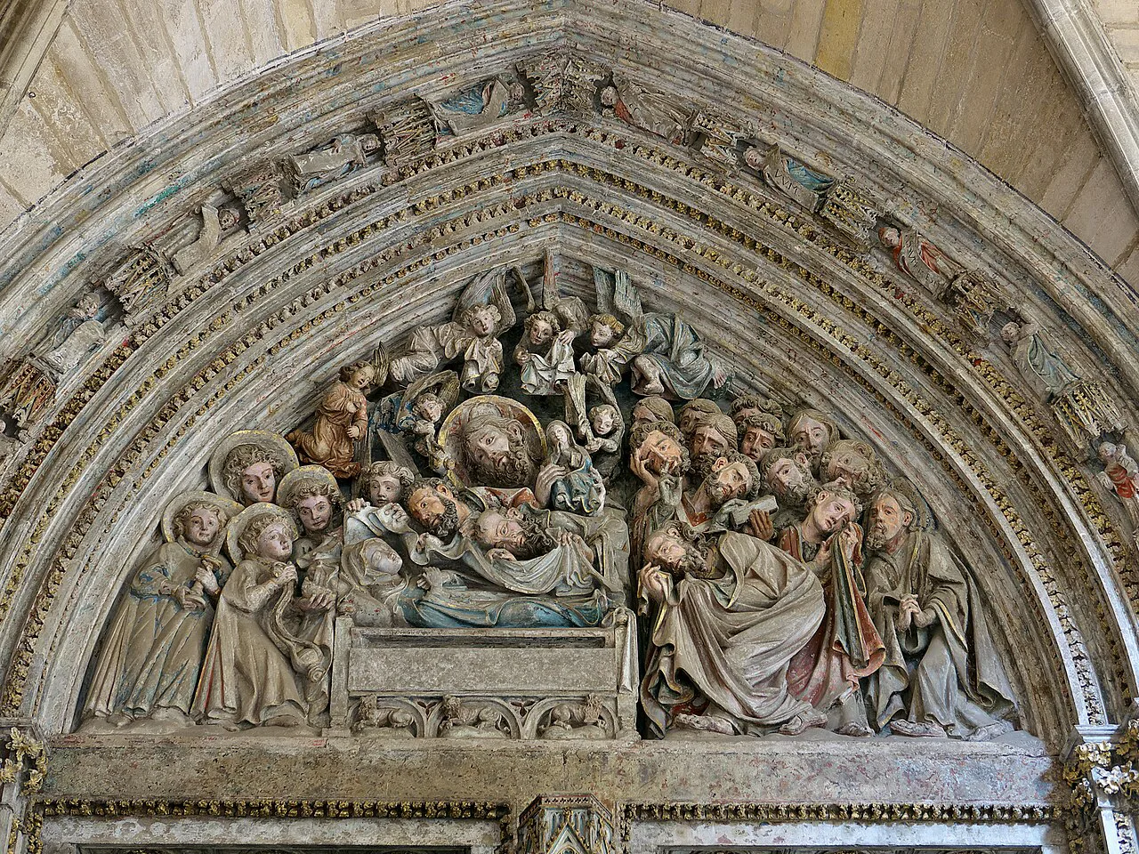 The tympanum of the Puerta del Amparo in Pamplona Cathedral's cloister.