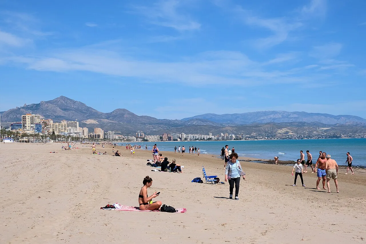 San Juan beach in Alicante on the Costa Blanca, with mountains behind.