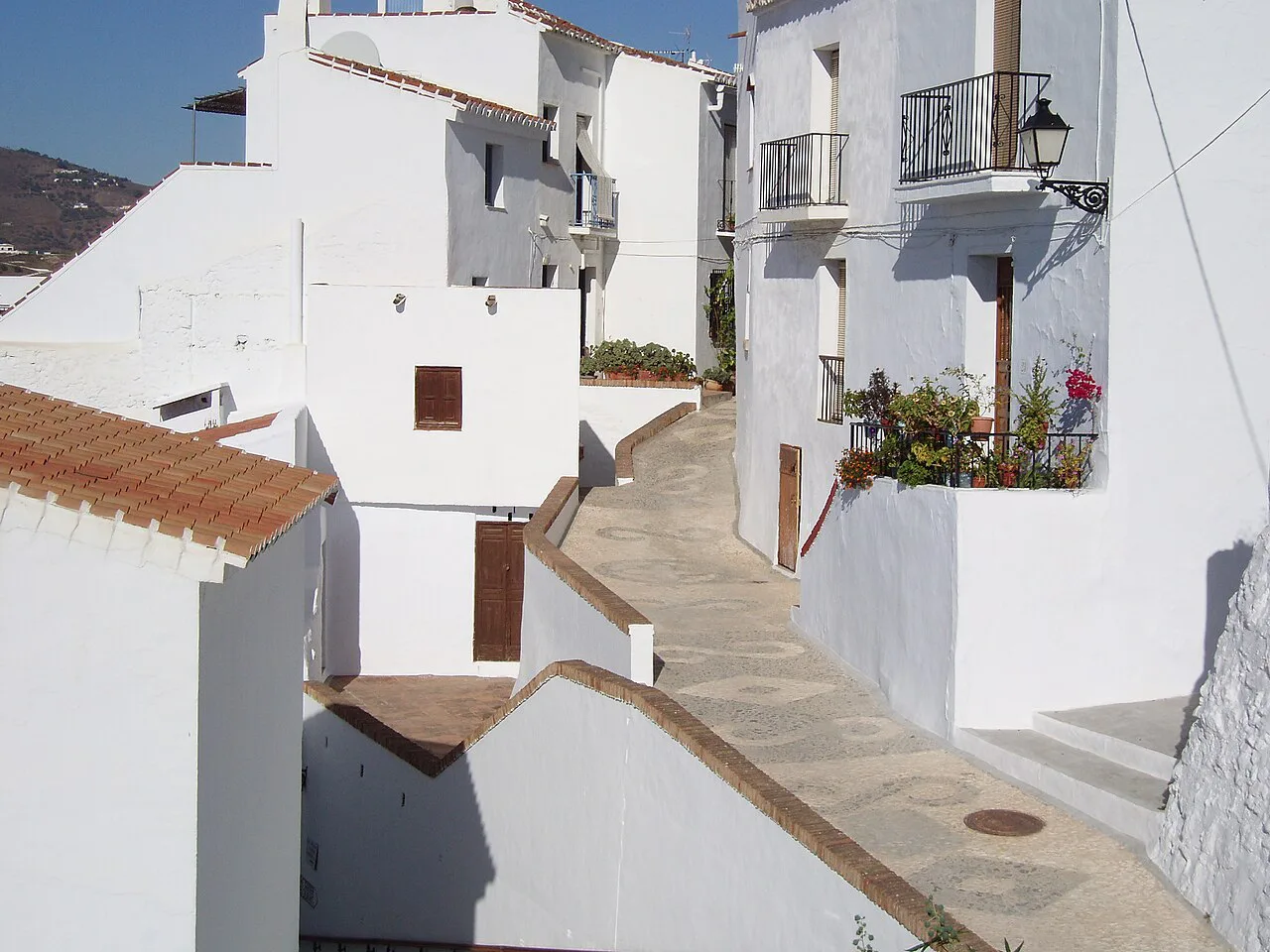 A whitewashed street with steps in Frigiliana.