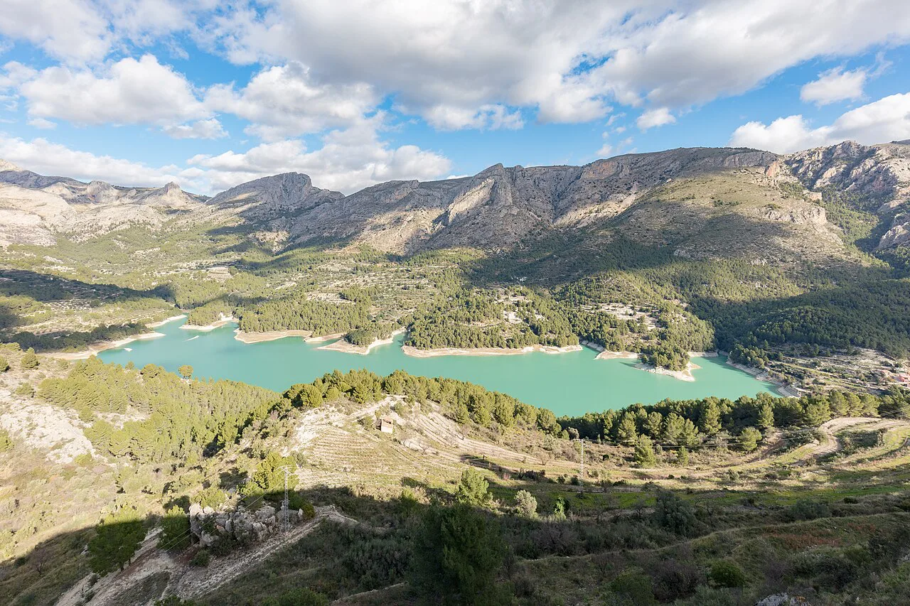 The turquoise Guadalest Reservoir in the mountains near Guadalest.