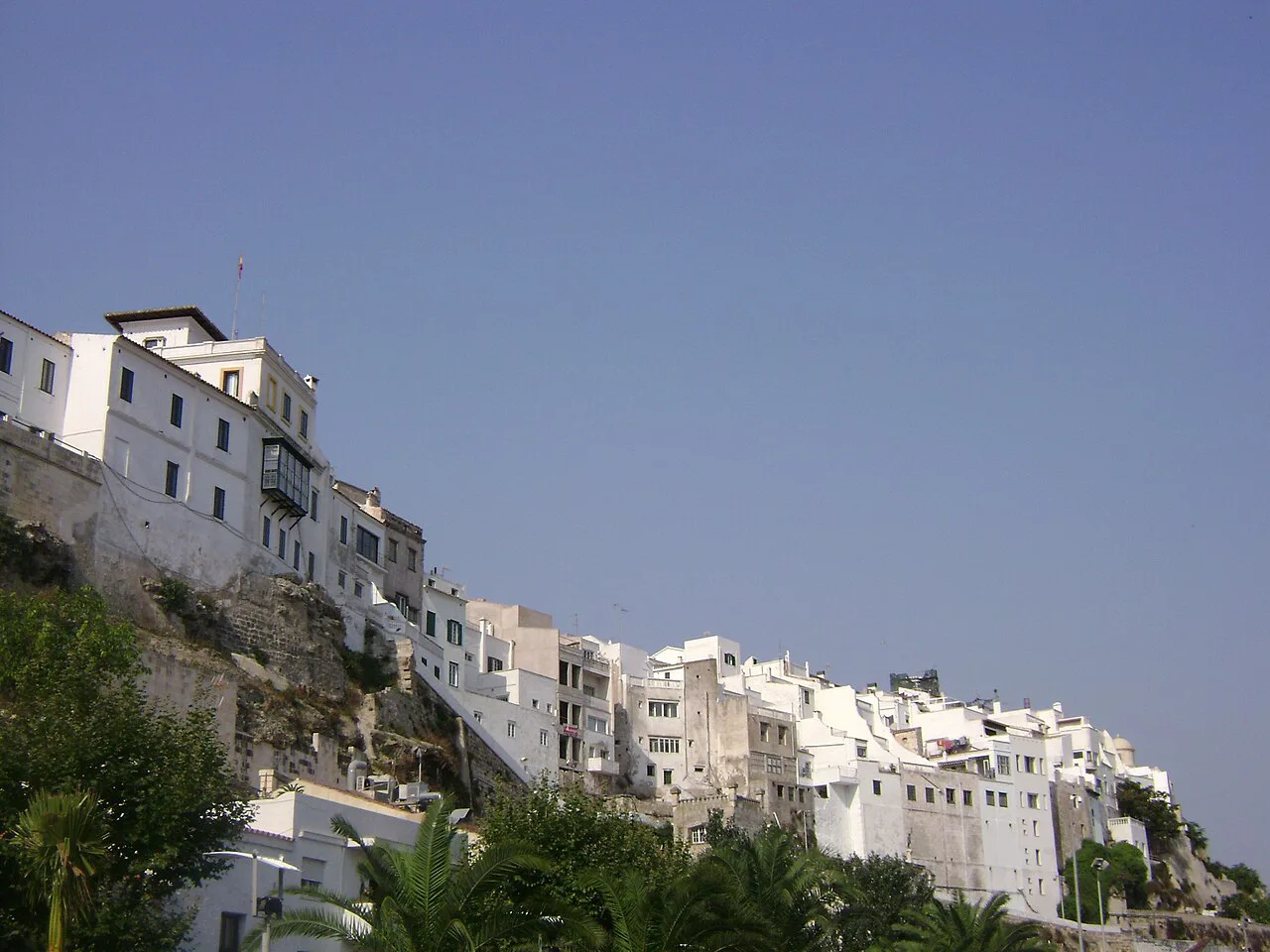 White houses on the cliffs above the harbour, Mahón (Maó).