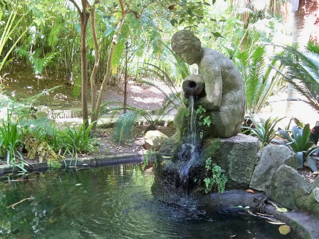 The nymph fountain sculpture in La Concepción botanical garden, Málaga.