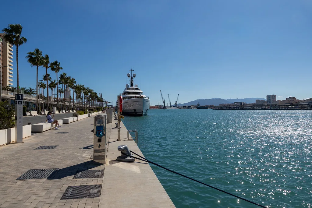 The palm-lined quayside of Málaga's port.