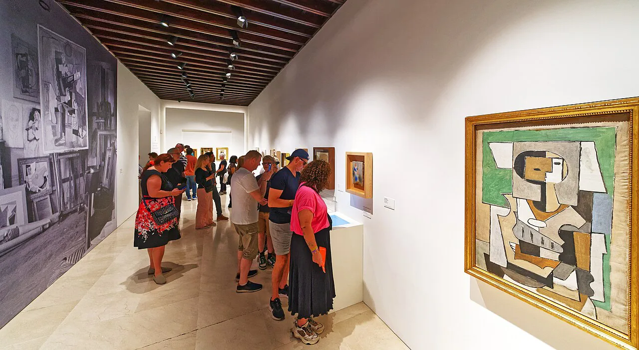 Visitors in a gallery of the Museo Picasso Málaga.