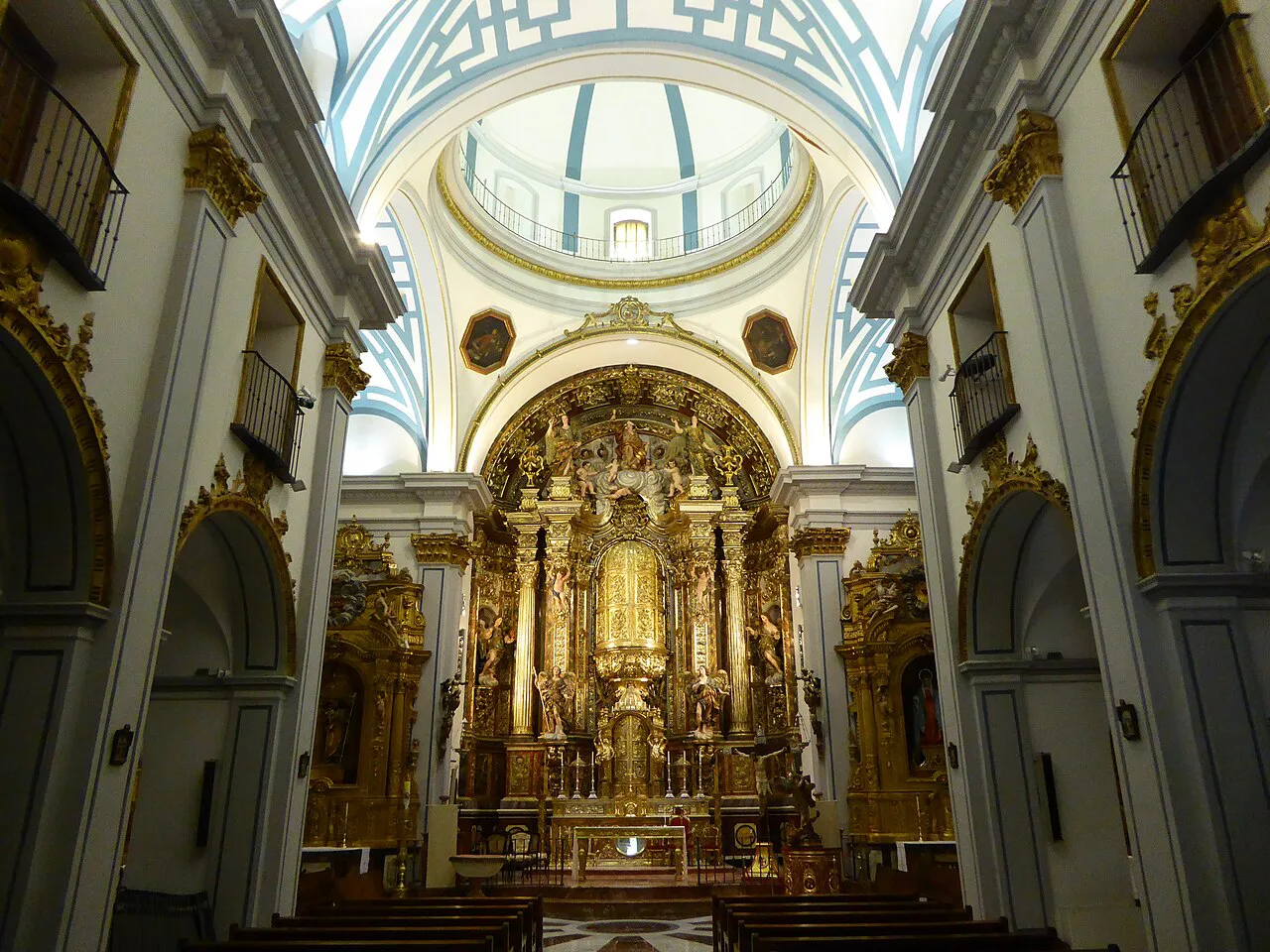 The high altar and dome inside Murcia Cathedral.
