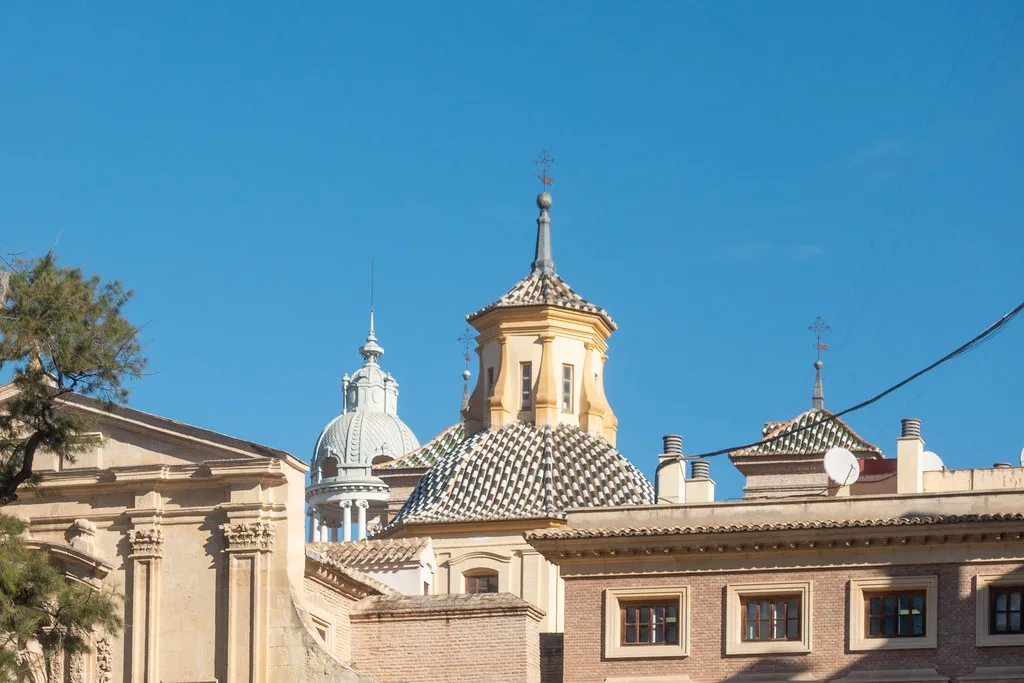 Church domes and a bell tower in Murcia.
