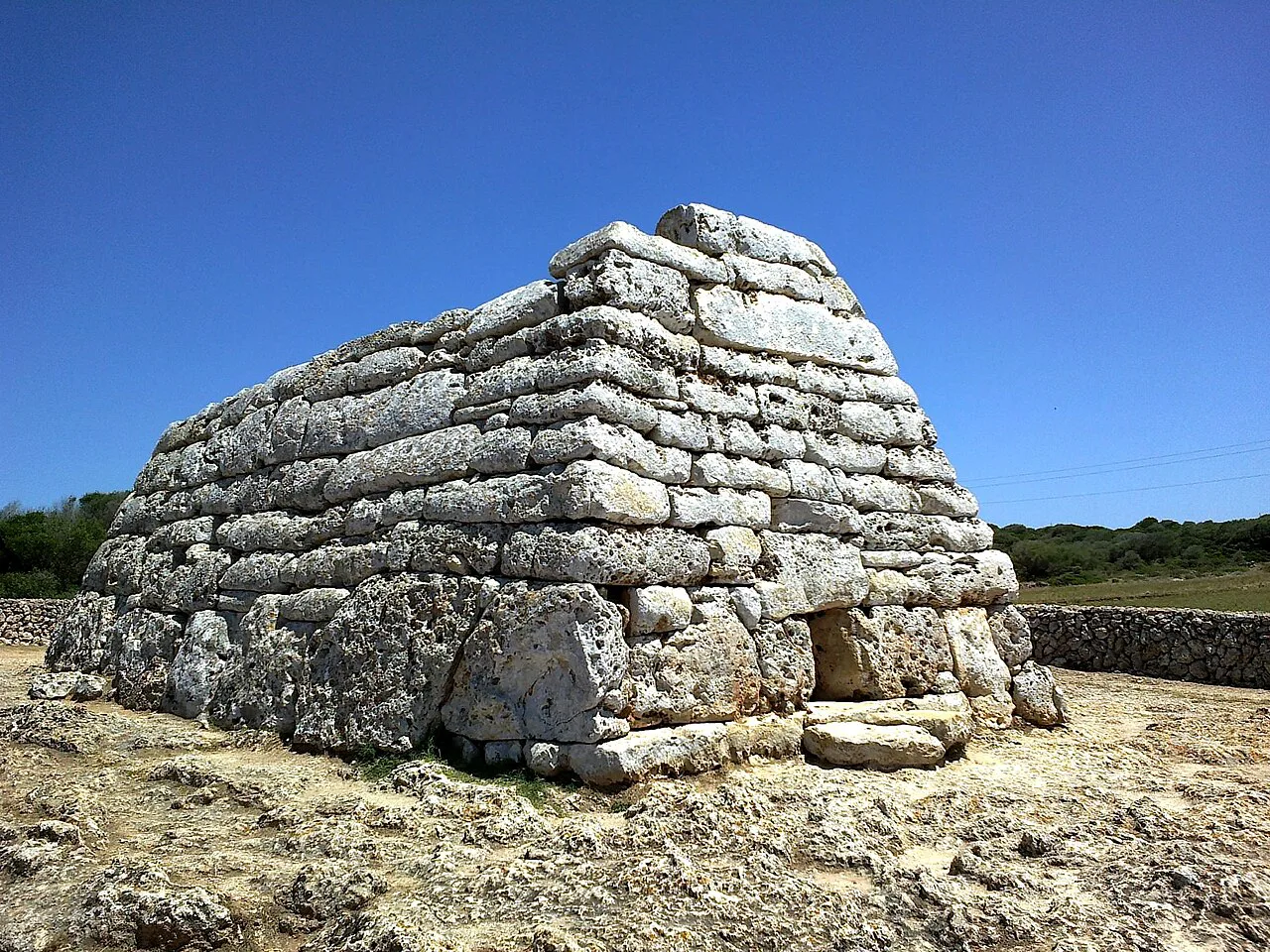 The Naveta des Tudons, a prehistoric stone tomb near Ciutadella, Menorca.