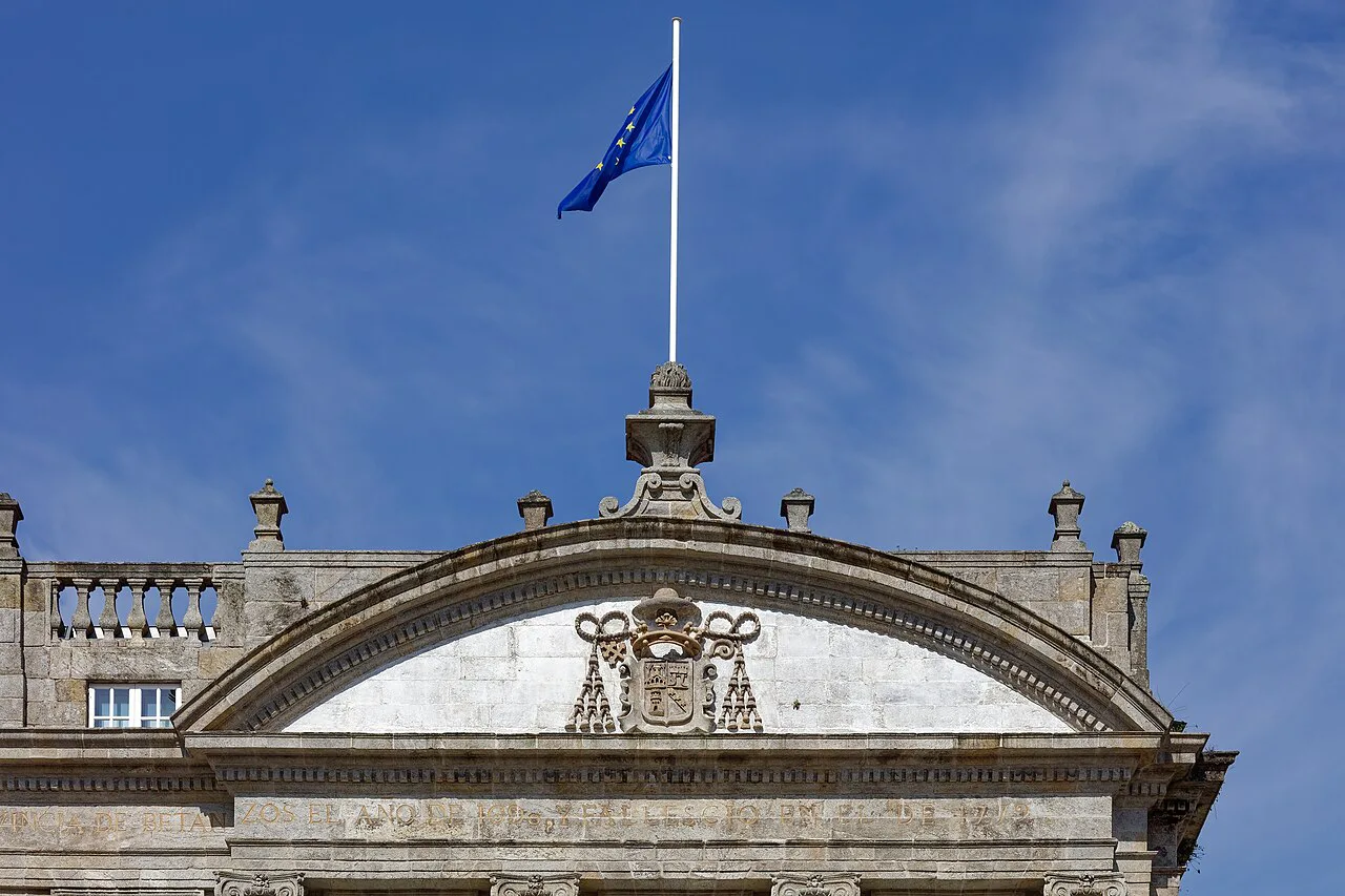 The tympanum of the Pazo de Raxoi with a flag, Santiago de Compostela.