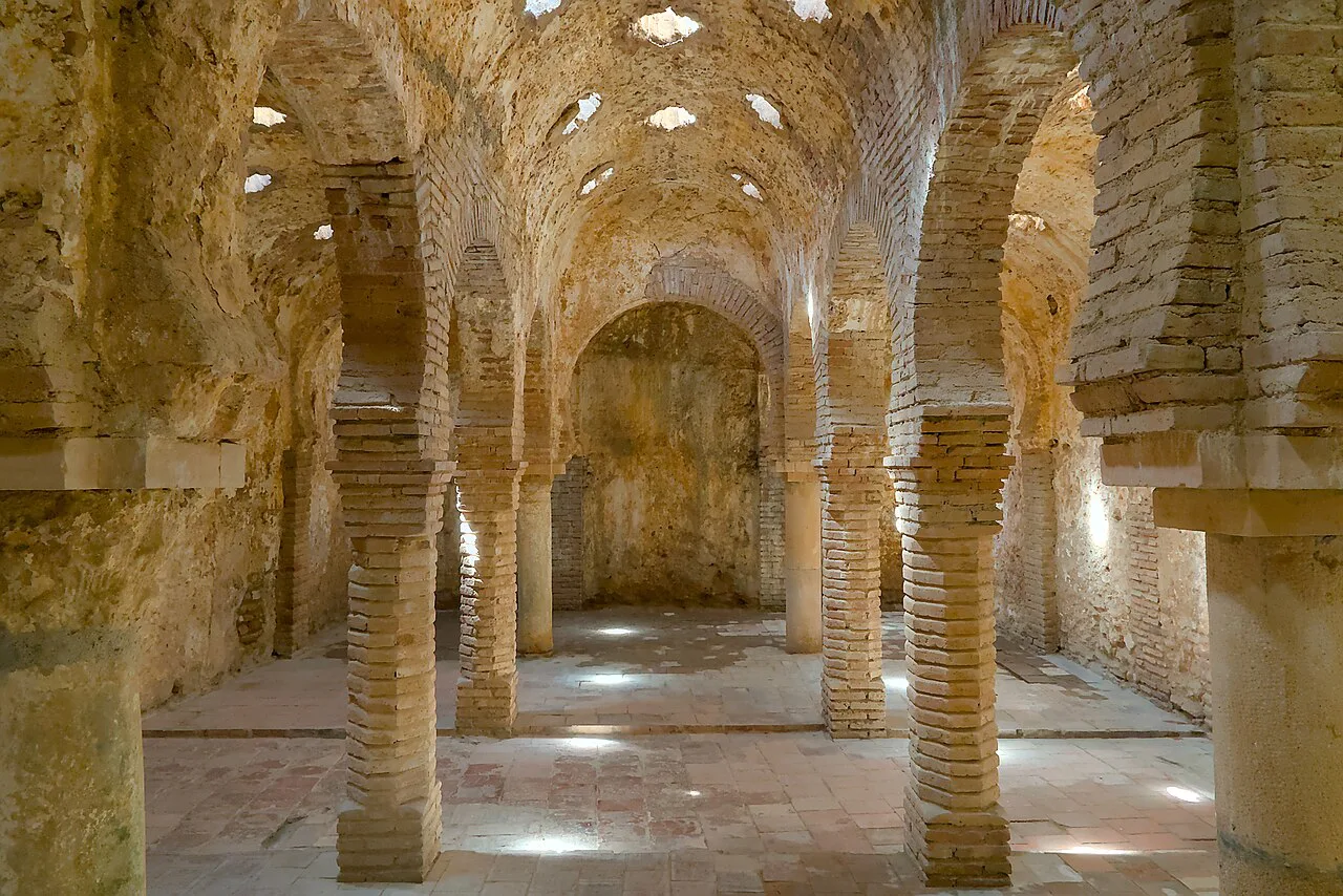 The arches and star-shaped skylights of the Arab baths in Ronda.
