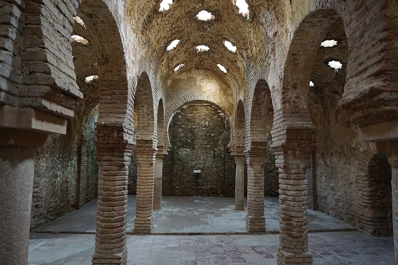 The horseshoe arches inside the Arab baths of Ronda.