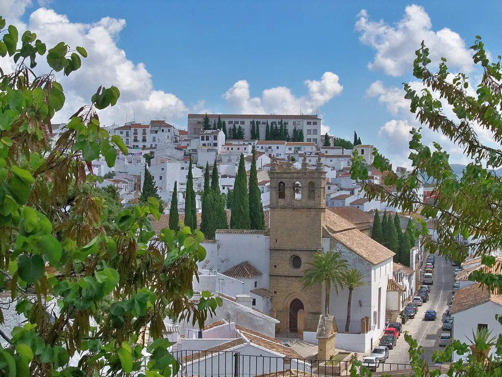 Whitewashed houses and a church tower in Ronda.