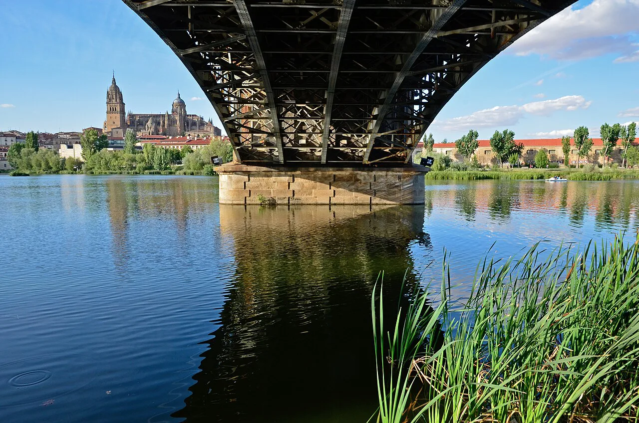 Salamanca's old quarter and cathedral seen across the Tormes from under the Enrique Estevan bridge.