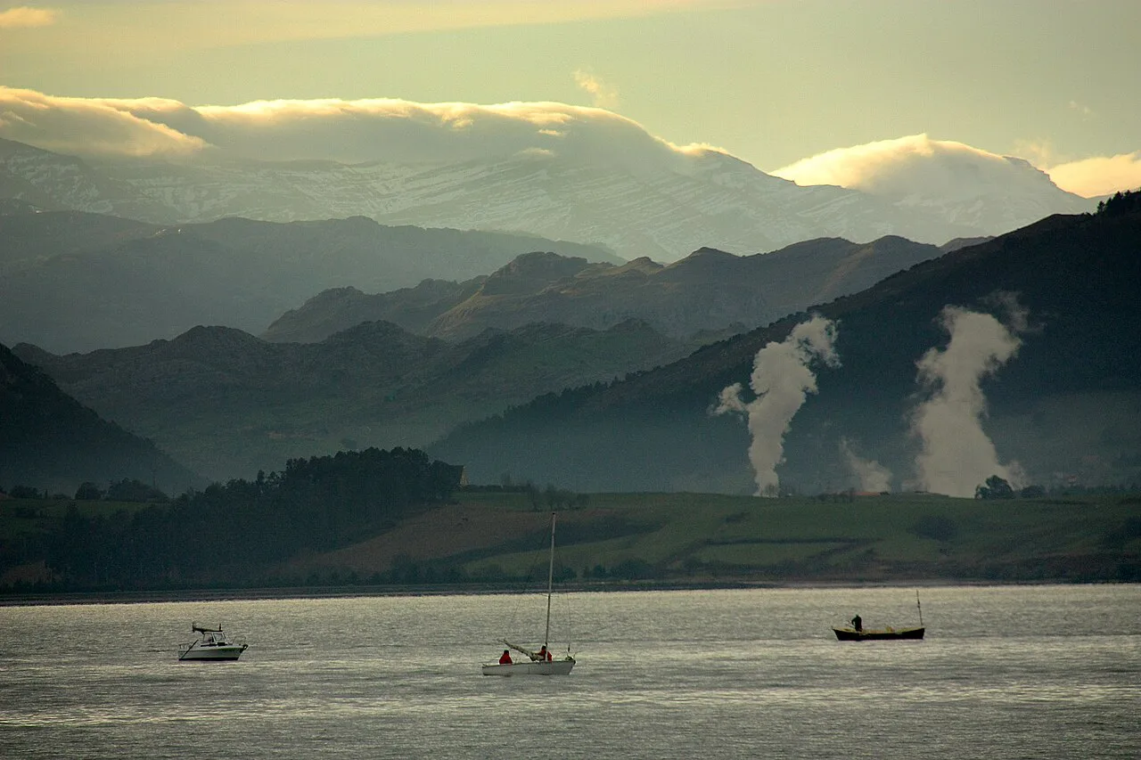 Boats on the bay at Santander, with mountains beyond.