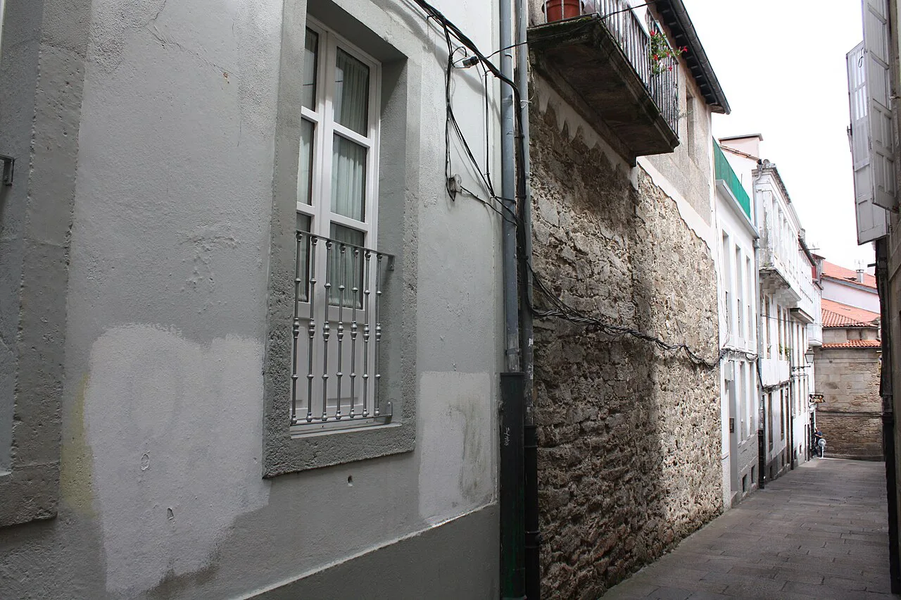 A surviving stretch of Santiago de Compostela's old city wall on Rúa Entremuros.