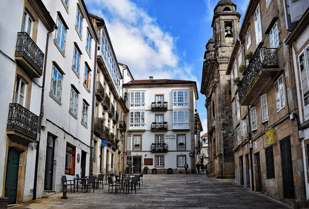 A street opening onto a square in Santiago de Compostela's old town.