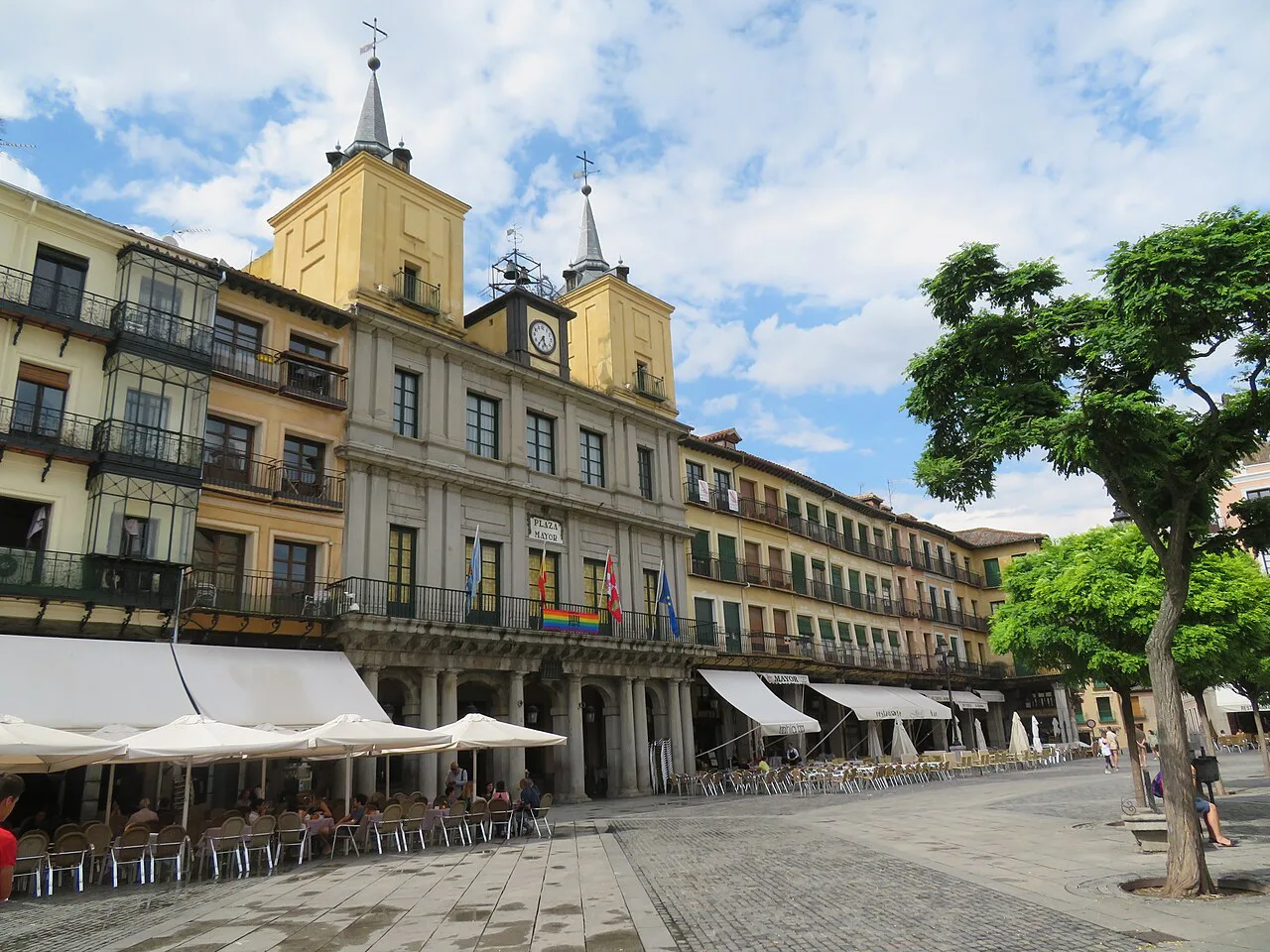 Arcaded buildings and the town hall on the Plaza Mayor of Segovia.