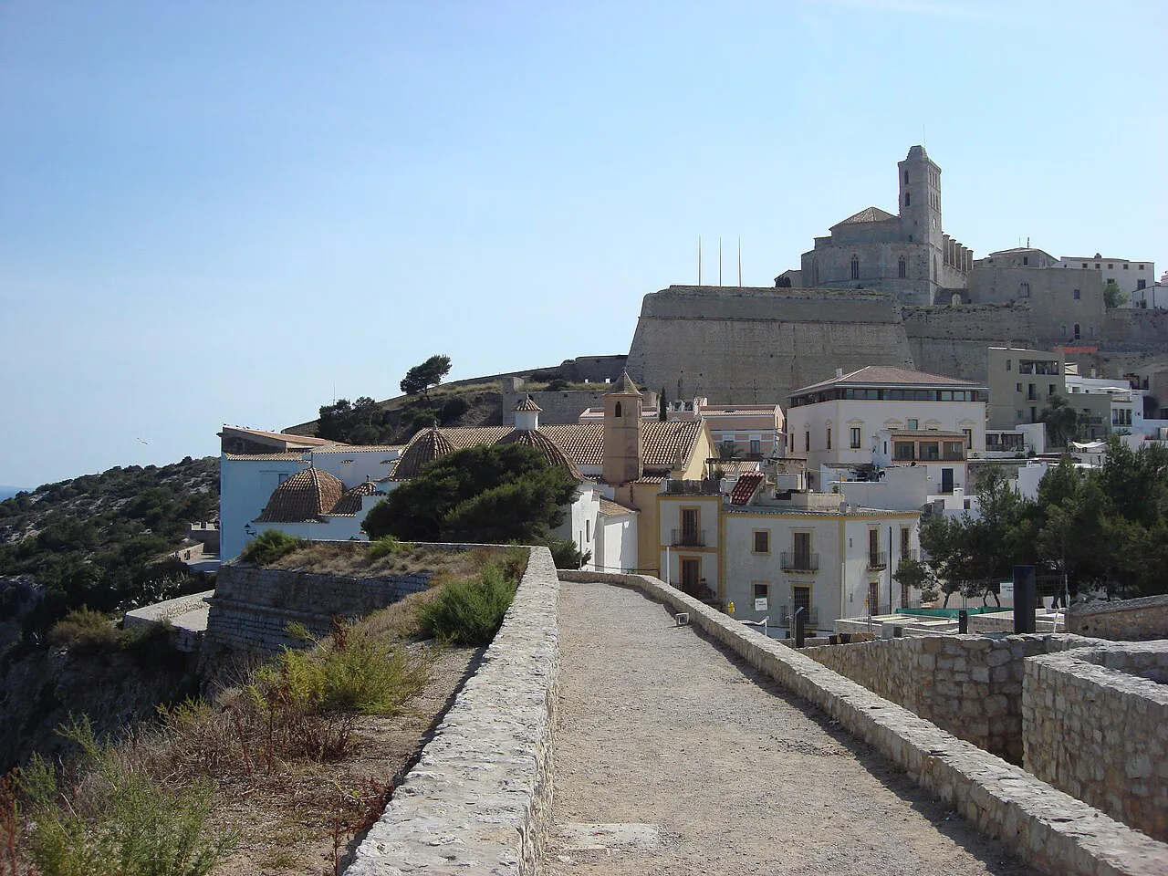The walls of Dalt Vila and the cathedral tower, Ibiza Town.