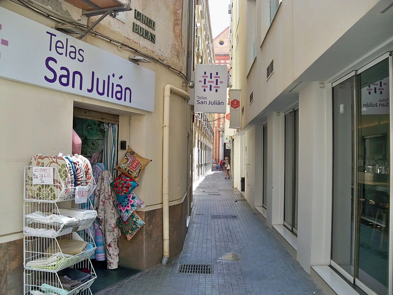 Shops on Calle Cinco Bolas in Málaga's historic centre.