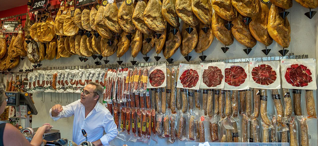 Hams hanging in a shop in Málaga's old town.