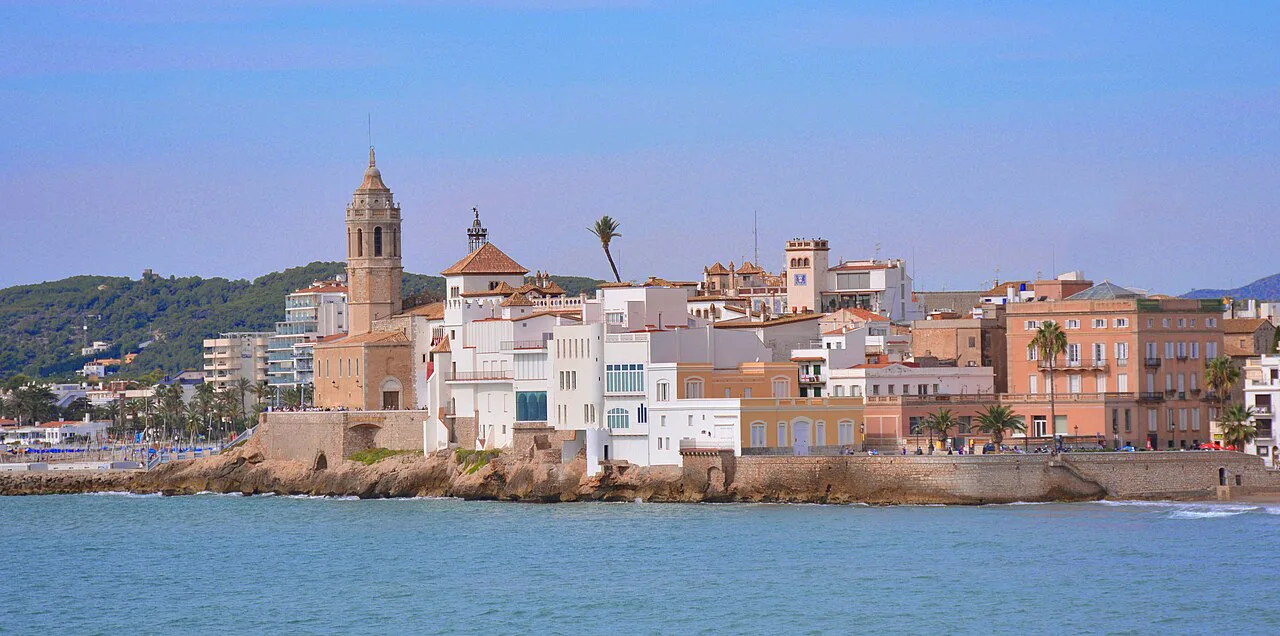 The church of Sant Bartomeu i Santa Tecla and the seafront of Sitges.