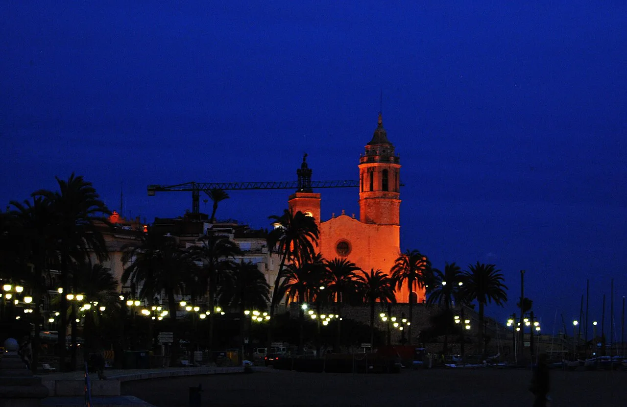 The Church of Sant Bartomeu i Santa Tecla lit at night, Sitges.