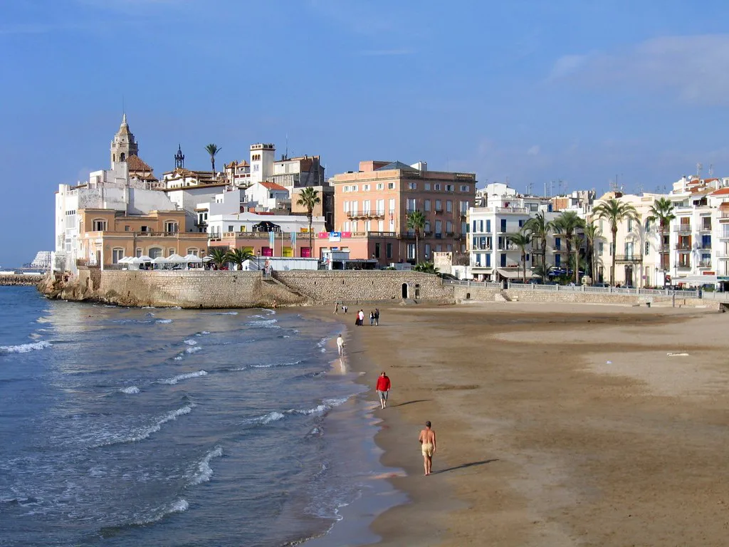 Sitges beach and the church of Sant Bartomeu i Santa Tecla.