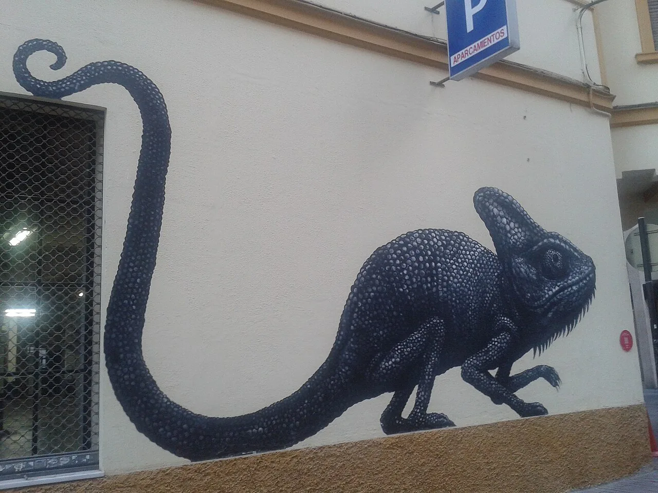 Street art of a chameleon in the Soho district, Málaga.