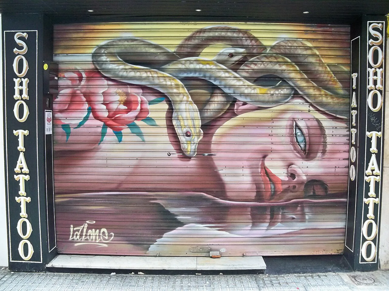 A mural on a shop shutter in the Soho district, Málaga.