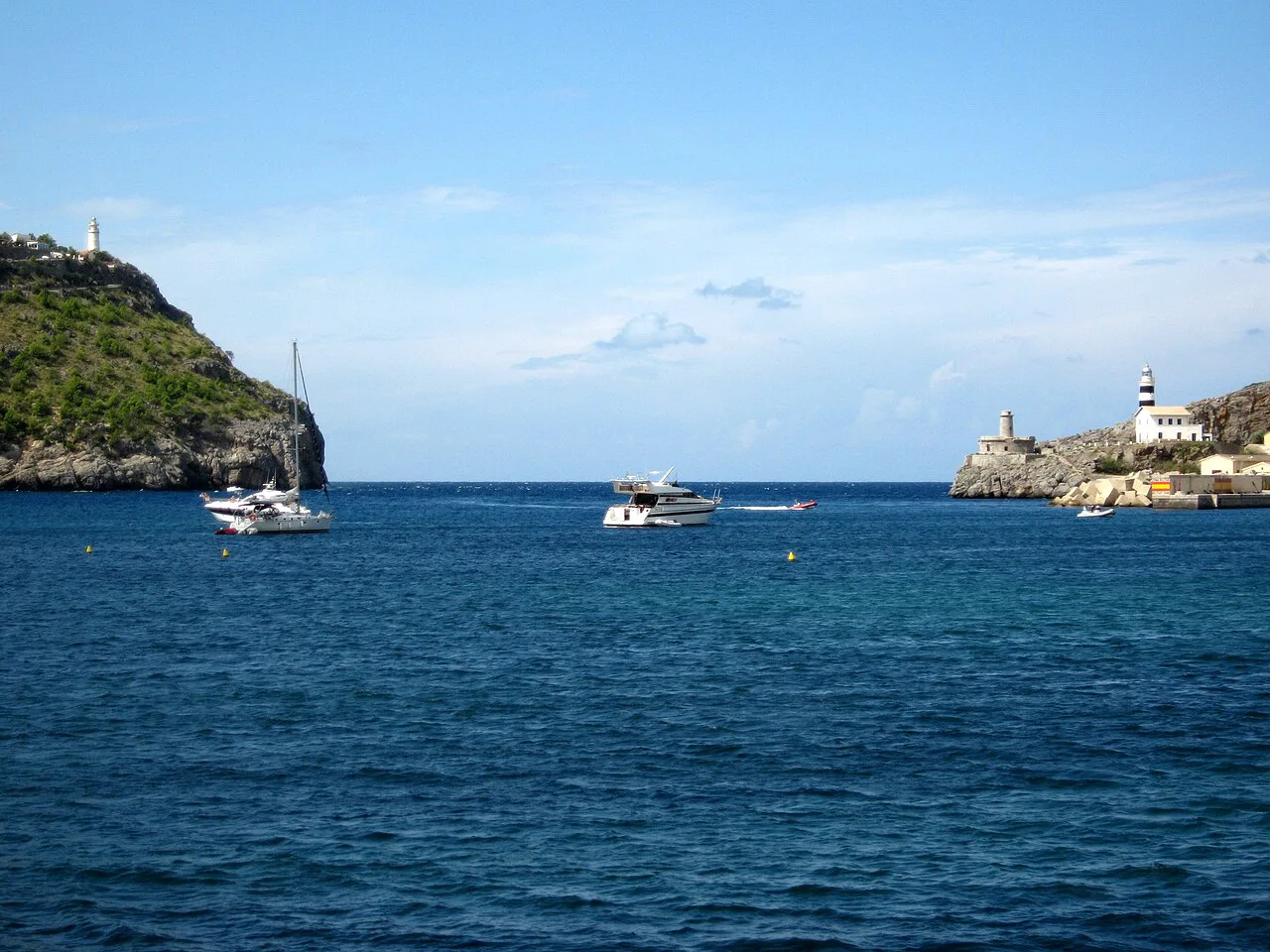Boats in the bay at the harbour entrance of Port de Sóller.