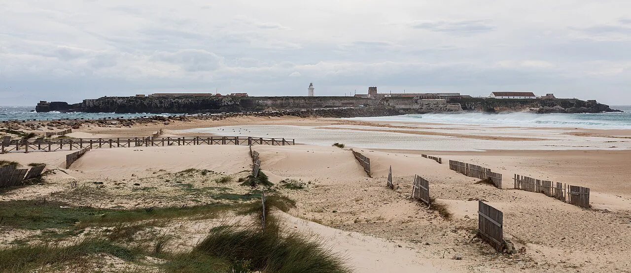 Tarifa Island seen across the beach and causeway, Tarifa.