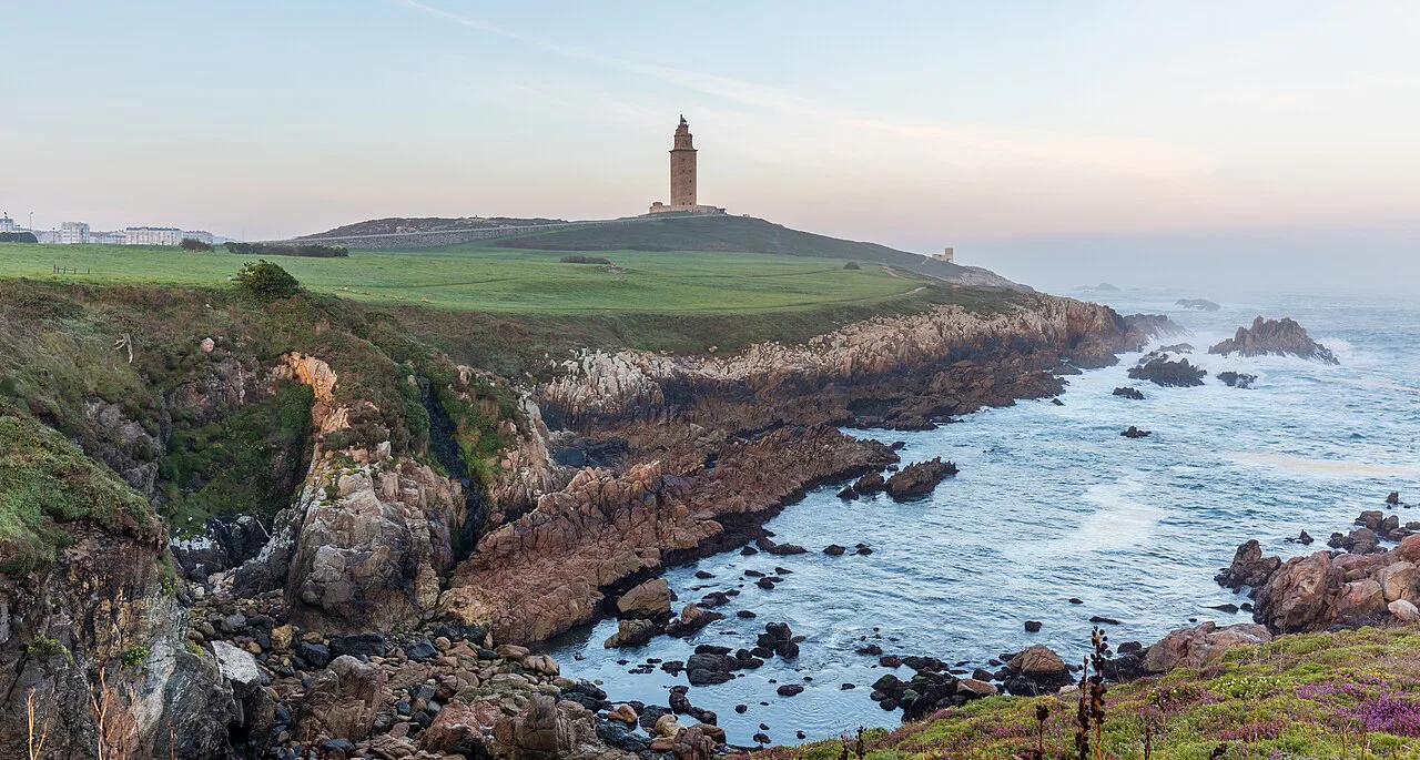 The Tower of Hercules above the rocky coast of A Coruña.